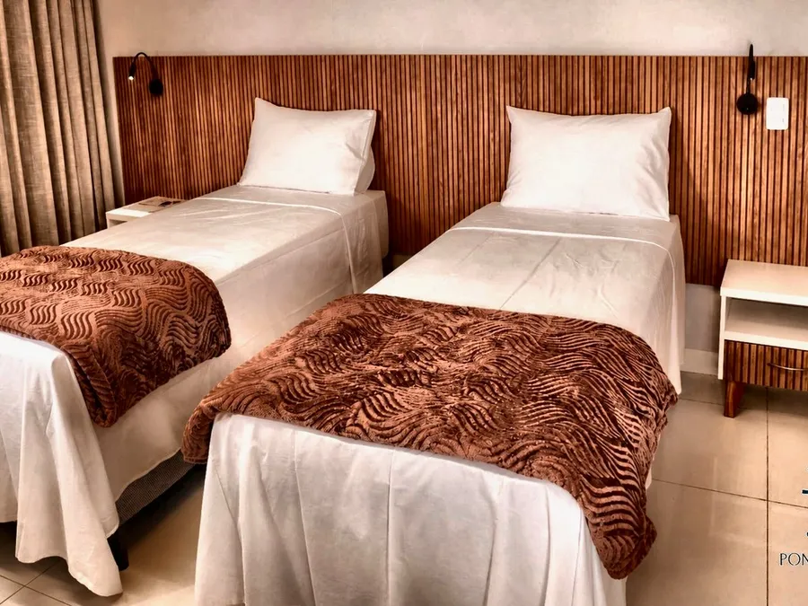 Apartamento com camas de solteiro